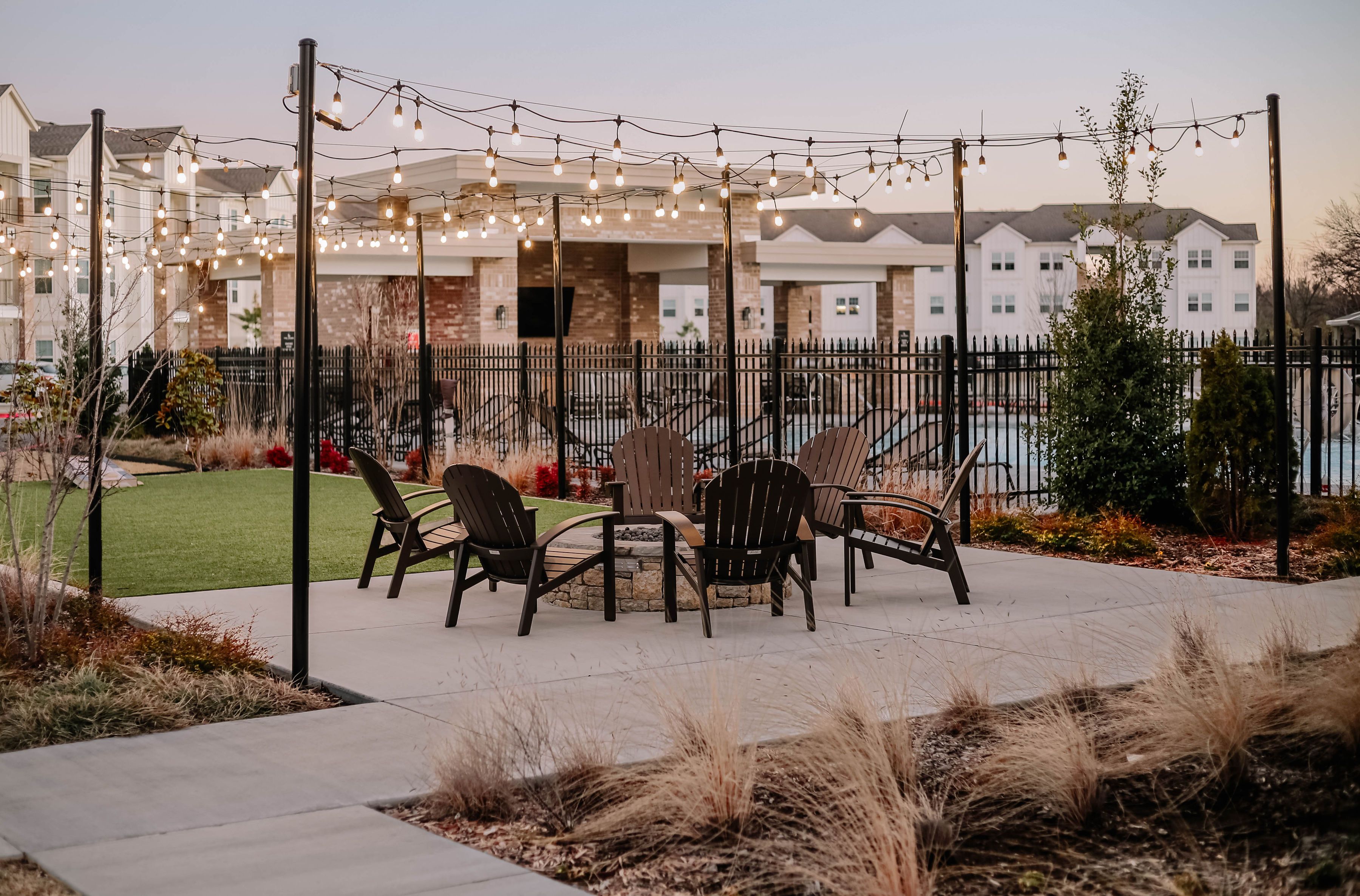 Elegant outdoor patio with string lights and seating for relaxed evening gatherings